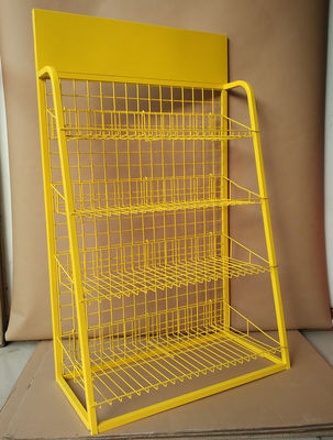 A exposição amarela do supermercado do metal da cor submete a posição do assoalho